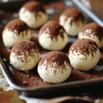 billes de tiramisu roulées dans du cacao, servies sur un plateau