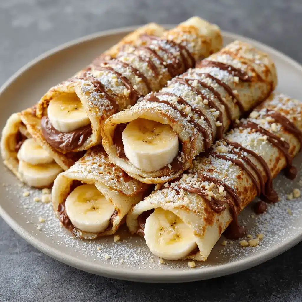 Crêpes roulées au Nutella et rondelles de banane servies en bouchées façon makis