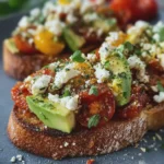 Tartare de Tomates Confites, Avocat & Feta sur Toasts Croustillants